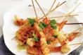 Indiase garnalen met raita en wokgroenten